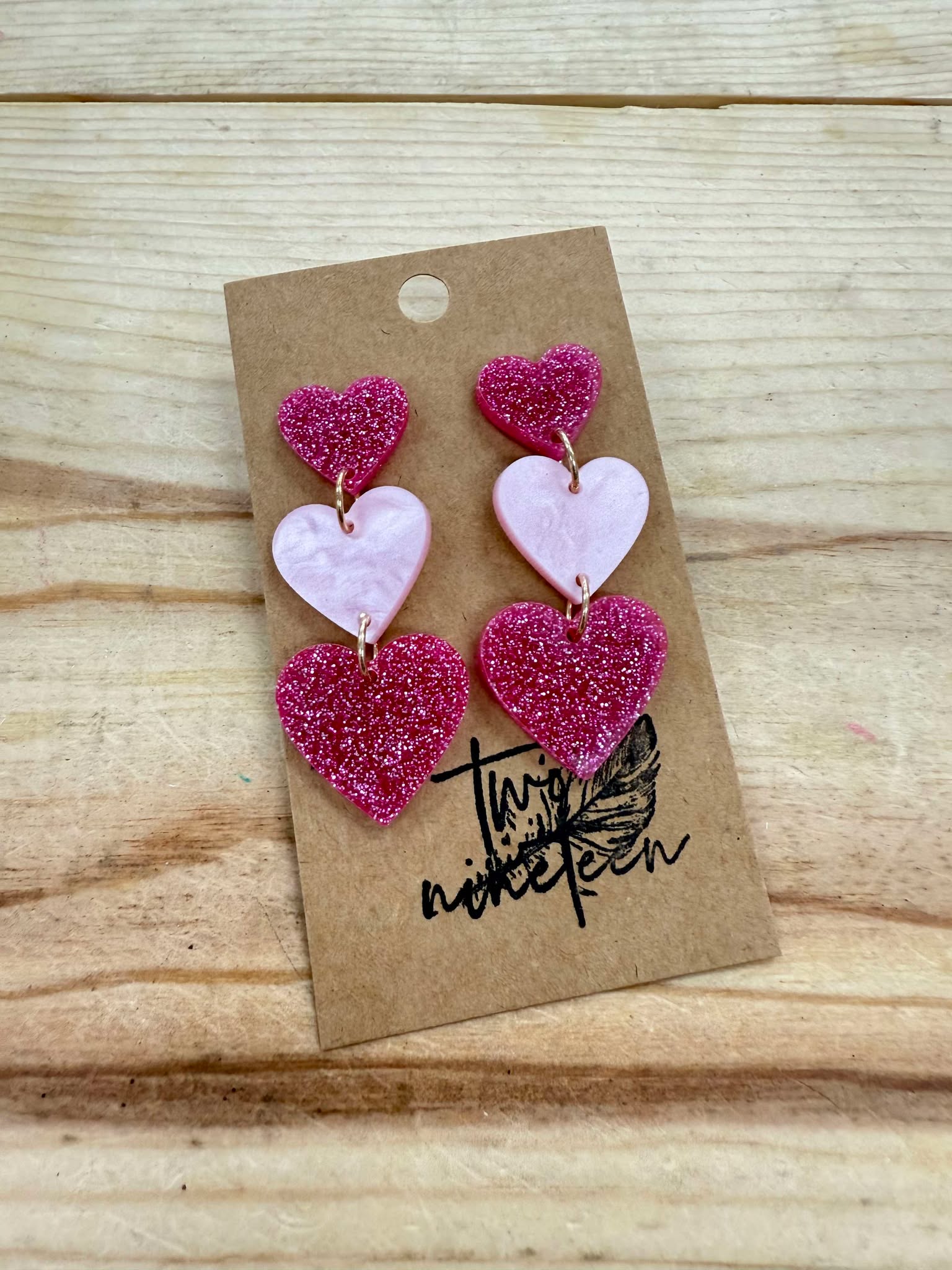 String of Hearts Pink Glitter Earrings